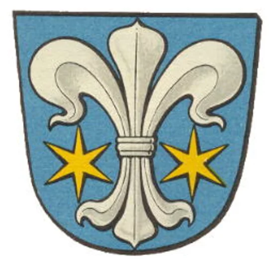 Blaues Wappen mit weißer Lilie und zwei goldenen Sternen.